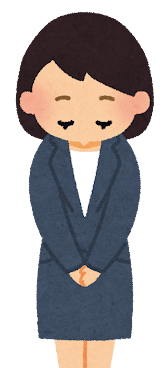 お詫びするスタッフ